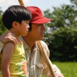 Steve Yeun e il piccolo Alan Kim in Minari